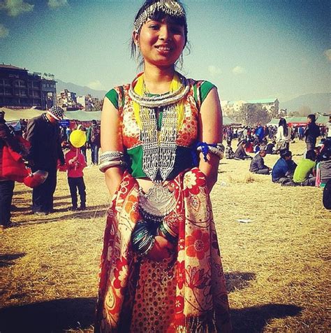 Festive Tharu Attire As The Nepalese Celebrate The Convergence Of Maghe