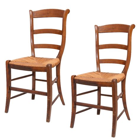 Every part of this solid wood chair is designed for optimal functionality, from its seat height and back to its dimensions. Pair French Antique Wood Dining Chairs with Rush Seats : On Antique Row - West Palm Beach - Florida