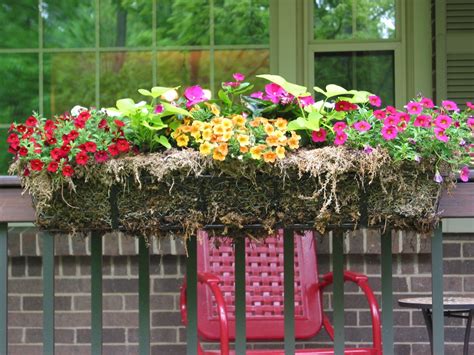 This planter is a perfect choice for growing vegetables, herbs, and flowers on the balcony, in the garden, on the patio, etc. Niesz Vintage Home...and fabric: Porch Railing Planter Boxes
