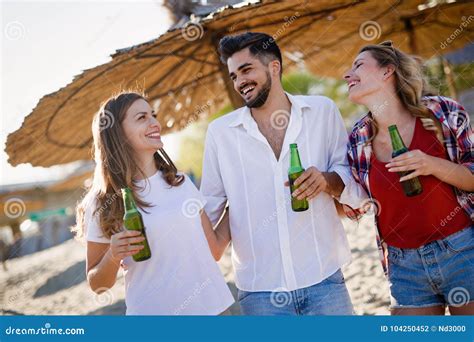 Happy People Drinking And Having Fun At Beach Stock Photo Image Of