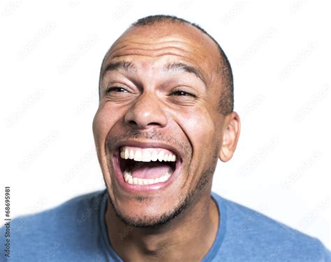 Portrait Of A Mixed Race Man Laughing Hysterically Foto De Stock