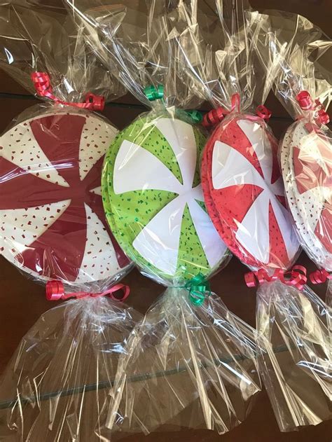 Laced with peppermint and cinnamon candies, these candy cane cookies are a festive addition to the holiday dessert table. Big Peppermint Candy Decorations, set of 6 in 2020 | Candy ...