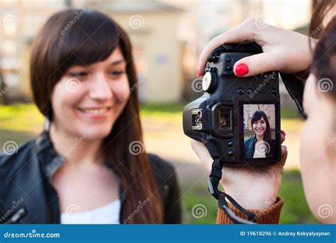Photographing A Model In The Center Of The Park Royalty Free Stock