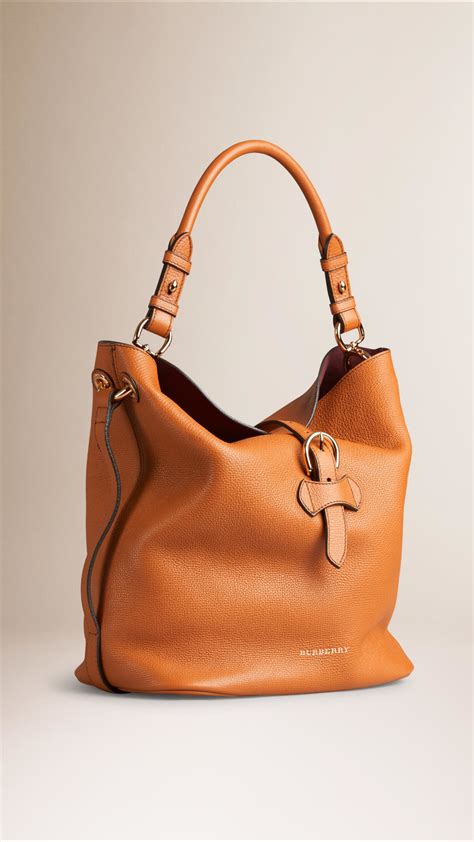 Burberry Medium Buckle Detail Leather Hobo Bag in Cognac (Brown) - Lyst