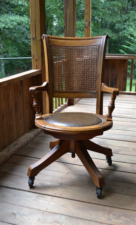 Us $ 0.35 / piece min. Vintage Wood Oak Office Chair Swivel Wheels Cane Back Vinyl