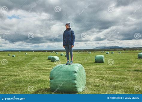 Woman On A Hay Bales In A Field Stock Image Image Of Conservation