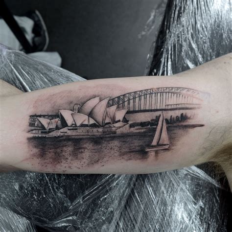 A Mans Arm With A Black And White Photo Of The Sydney Opera House