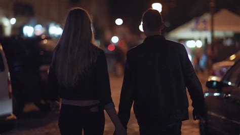 Young Couple Holding Hands Walking Through Stock Footage Sbv 324095977