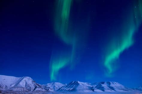 A Brilliant Glimpse Of The Aurora Borealis Dancing In The Sky Near The
