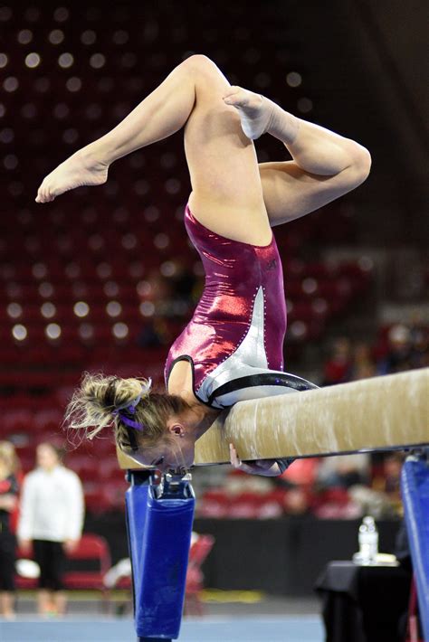 University Of Denver Gymnast Julia Ross Holds A Pose During Her Beam Mount Photo Taken On March