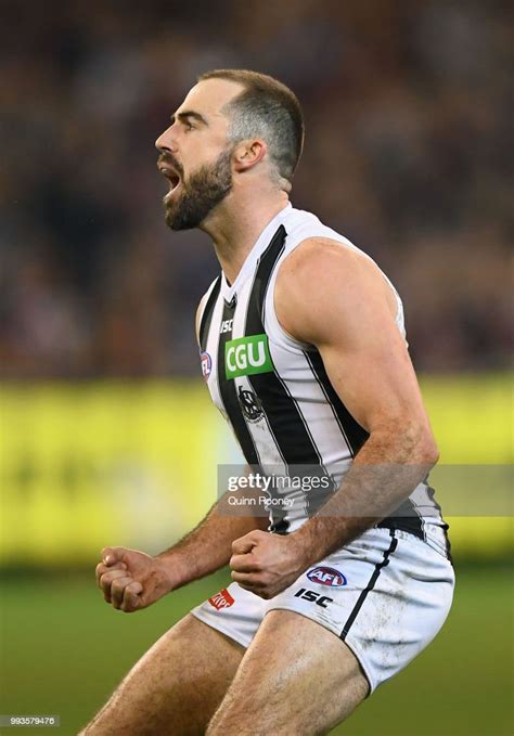 Steele Sidebottom Of The Magpies Celebrates Kicking A Goal During The