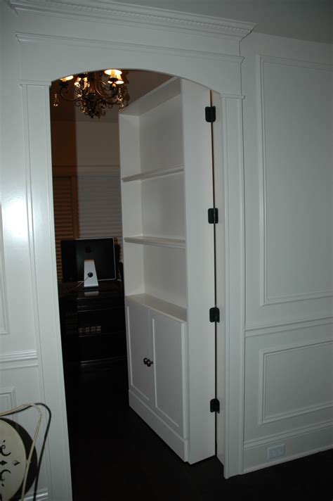 This keeps things disguised while creating a sturdy place to mount your hinge and anchor your cable out of sight below. Secret Room Hidden Bookcase Door Plans DIY Free Download ...