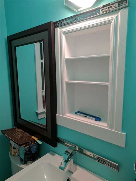 Mirror cabinet doors are elegant and add a modern appeal. I made a recessed medicine cabinet hidden behind a sliding ...