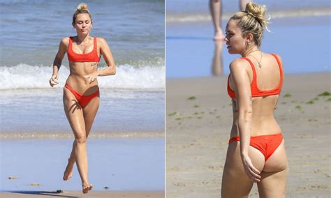 Miley Cyrus Sizzles As She Stretches Her Toned Body In Sexy Red Bikini Ahead Of Endless Summer