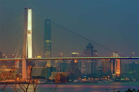 Nanpu Bridges At Sunset In Shanghai By Blackstation