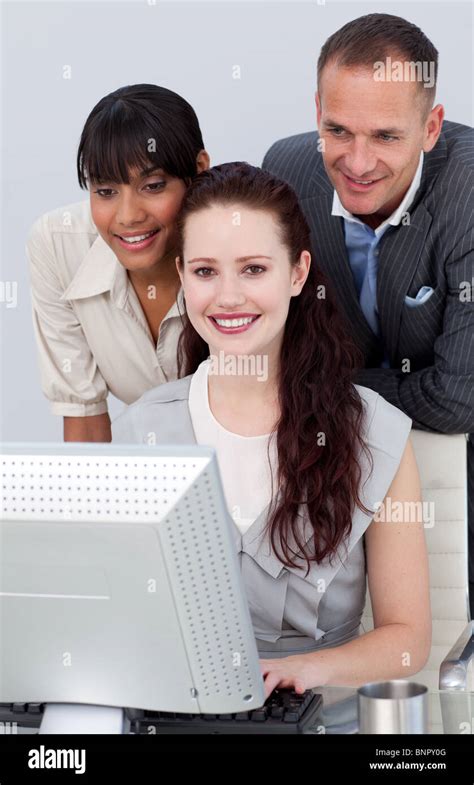 Smiling International Business People Working Together Stock Photo Alamy