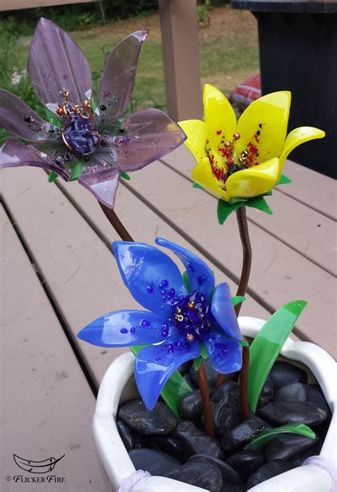 It will stick and can damage your depending on the type of glass i am fusing, it usually fires in about 5 minutes to 5 minutes and 30 the second one, the center is millefiori, white shards i cut with nippers and the stem of the flower. Fused Glass flowers - Flicker Fire Leather