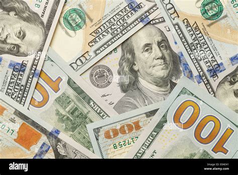 New One Hundred Dollar Bills In Scattered Pile Laying Flat Stock Photo