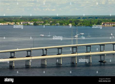 Barron Collier Bridge And Gilchrist Bridge In Florida With Moving