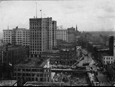 An Old Black And White Photo Of A City