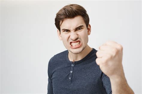 Free Photo Angry Aggressive Guy Grimacing And Shaking Fist Threatening