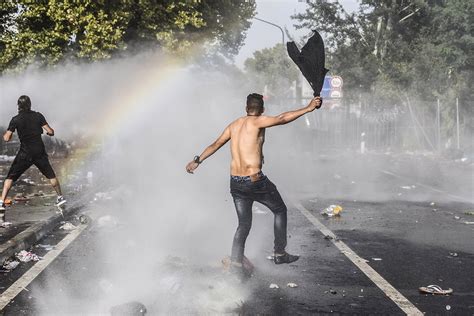 Hungary Riot Police Fire Tear Gas And Water Cannons At Refugees And