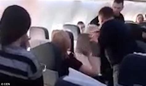 Airline Passenger Punches Drunk Man In The Face After He Threatened To Blow Up Their Plane