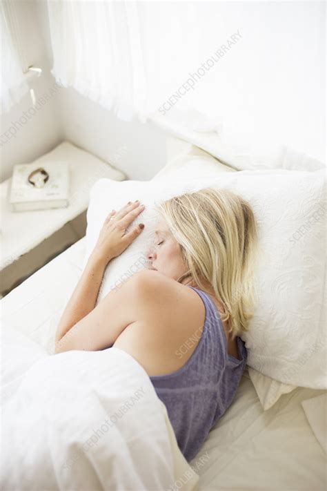 Blonde Woman Sleeping In A Bed Stock Image F Science Photo Library