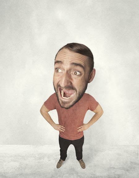 Funny Person With Big Head Makes Jesting Facial Expression Freestock