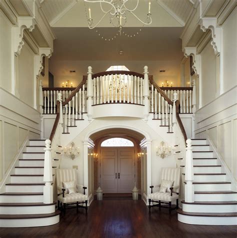When considering a new staircase, think about your family members and how they use the stairs to make the best choice because each kind has advantages and disadvantages. Dual Grand Staircase in double height space | House ...