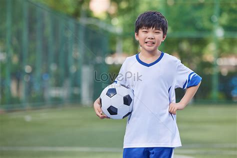 Little Boy Playing Football Image Picture And Hd Photos Free Download