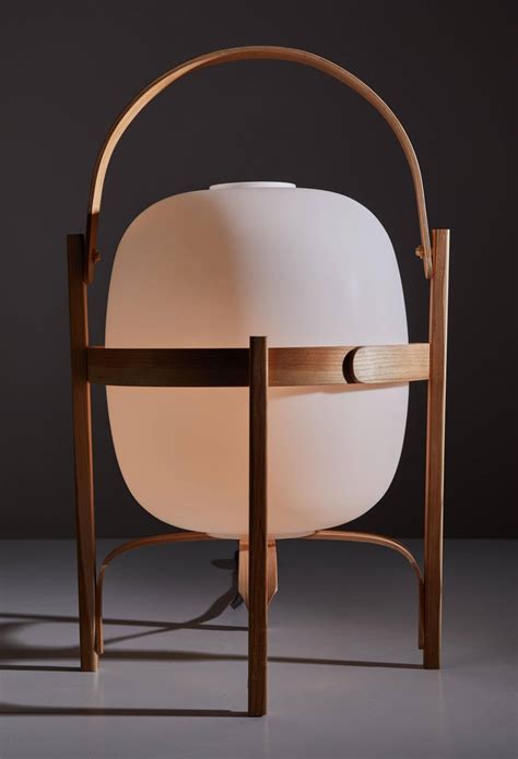 The handcrafted cesta table lamp has been made by means of a traditional steam bending it also includes a dimmer to control the light intensity. Cesta Table Lamp by Miguel Mila for Santa and Cole For ...