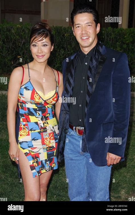 Russell Wong And Flora Cheung Telegraph