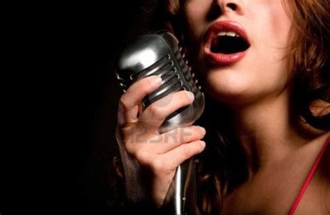 Beautiful Singer Singing With A Retro Microphone Singing Lessons