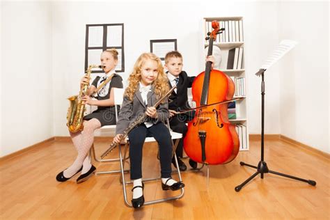 Happy Kids Playing Musical Instruments Together Stock Image Image Of