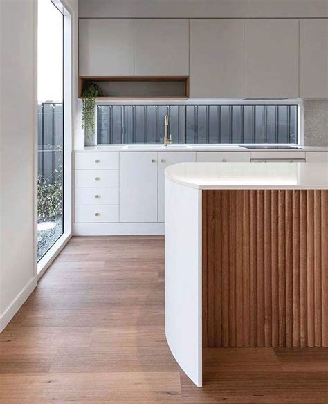 Click here to read my full disclosure policy. Kitchen goals! Loving the subtle curves and warm timber ...