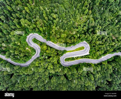 Winding Mountain Road With Cars On It Stock Photo Alamy