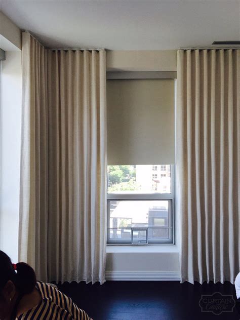 Stationary Ripple Fold Panels And Blackout Roller Shades By Alexandra