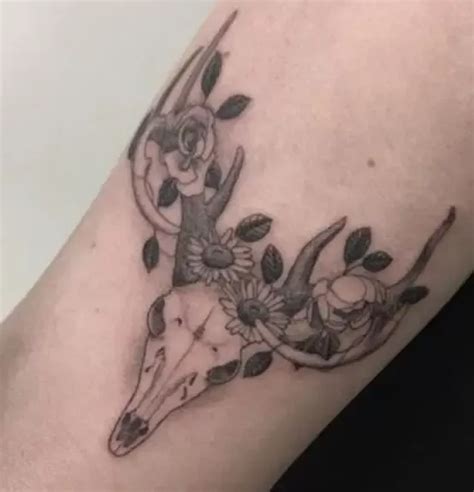 10 Deer Skull With Flowers Tattoo Designs Petpress Deer Skulls