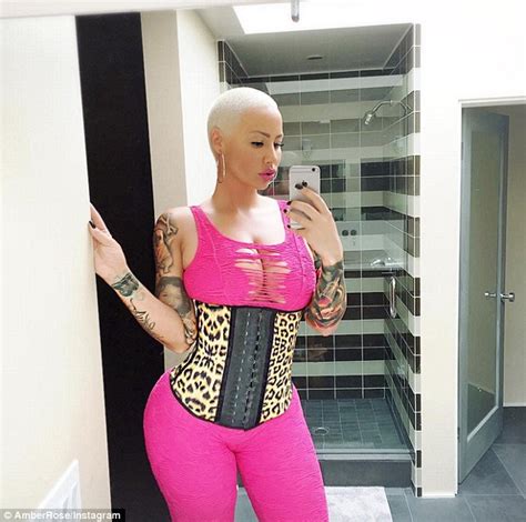 Amber Rose Looks Curvy In Neon Pink Bodysuit After Her Emoji App Earned Her 4 Million Daily