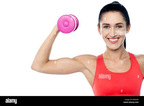 Woman In Gym Working Out With Dumbbell Stock Photo Alamy