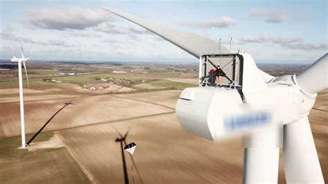 This futuristic combination of a wind turbine and an apartment complex harnesses natural energy while providing sustainable housing. Base Jump eolienne Noël (wind turbine for Christmas) - YouTube