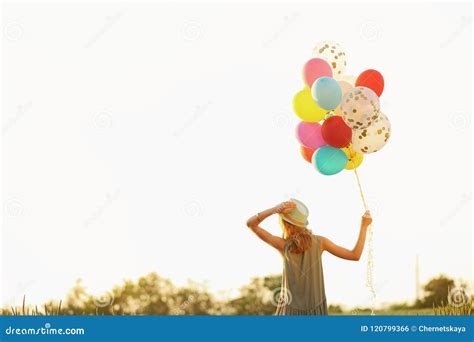 Young Woman With Colorful Balloons Outdoors Stock Photo Image Of