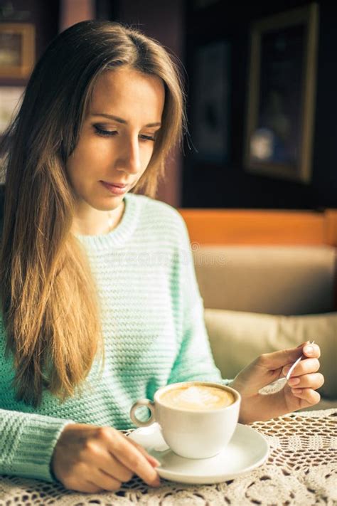 Fashion Image Of Woman Holding White Cup Of Morning Cappuccino Stock