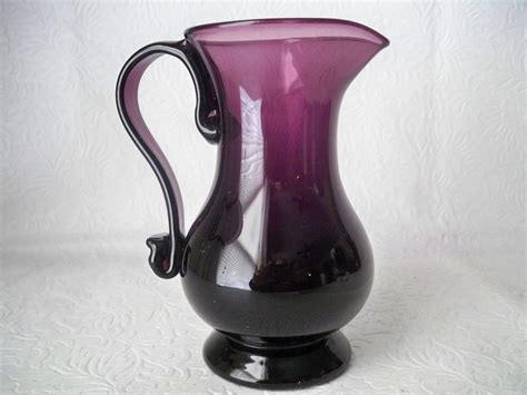 1960s Vintage Blown Glass Small Tall Pitcher In Amethyst Purple Color With Applied Handle Made