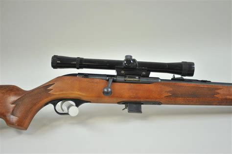 mossberg 341 bolt action 22 caliber rifle with tasco scope