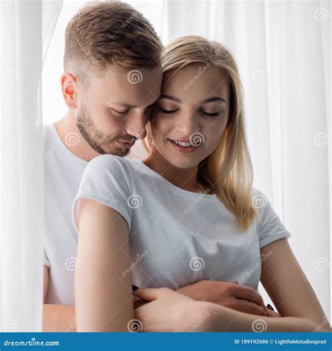 Handsome Man Hugging Beautiful And Smiling Stock Photo Image Of Beautiful Together