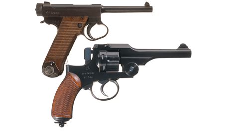 Two Japanese Military Handguns With Leather Holsters Rock Island Auction