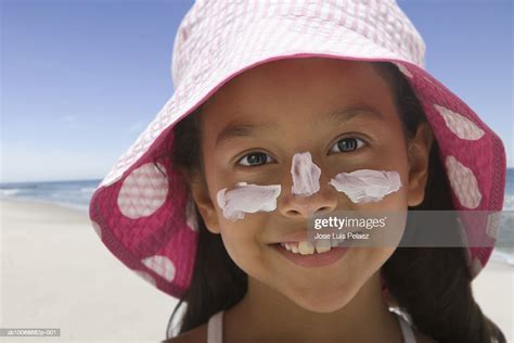 Girl On Beach With Sun Cream On Face Smiling Closeup Portrait High Res