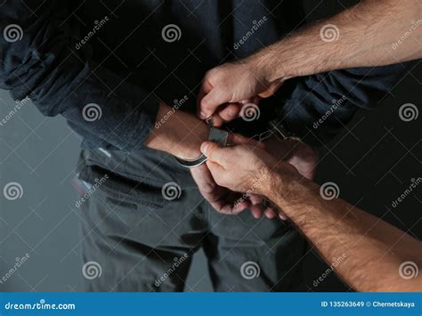 Man Putting Handcuffs On Drug Dealer Closeup Stock Image Image Of Criminal Arrest